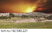 Forum (Oval Plaza) in Gerasa (Jerash), Jordan. Was built in the first century AD. Against the background of the sunset, 4K, time lapse (2024 год). Стоковое видео, видеограф Владимир Журавлев / Фотобанк Лори