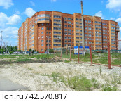Девятиэтажный девятиподъездный жилой дом. Построен в 2004 году СК "Дружба". Советская улица, 54. Город Домодедово, Московская область (2012 год). Стоковое фото, фотограф lana1501 / Фотобанк Лори