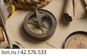 Antique Nautical Compasses on an Old World Map in Soft Lighting. Стоковое видео, видеограф Сергей Толмачёв / Фотобанк Лори