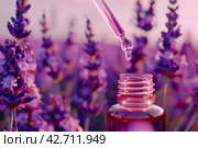 Lavender essential oil pouring from dropped into an amber bottle against a lavender flowers. Dropper filled herbal oil is pouring against blooming field, close-up. Health care, relaxation. Spa massage. Стоковое AI-изображение, AI-художник Марина Демидюк / Фотобанк Лори