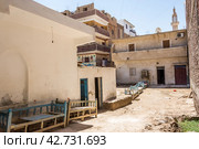 Трущобы в Африке, Египет (2023 год). Редакционное фото, фотограф Наталья Филатова / Фотобанк Лори
