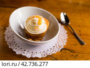 Delicious dessert - carrot cake with orange crumbs clos eup. Стоковое фото, фотограф Татьяна Яцевич / Фотобанк Лори