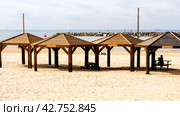 Tel Aviv, Israel - February 4, 2017: People relaxing on the beach of Tel Baruch in Tel Aviv, Israel. Редакционное фото, фотограф VittoriaChe / Фотобанк Лори