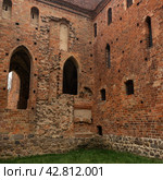 CHORIN, GERMANY - APRIL 01, 2024: Ruin of Chorin Abbey. Chorin Abbey (Kloster Chorin) is a former Cistercian abbey. An example of Gothic architecture. Founded in 1258. It was secularized in 1542. Редакционное фото, фотограф Sergey Kohl / Фотобанк Лори