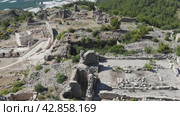 Bird's eye view of Rhodiapolis remains, near Kumluca in Antalya Province, Turkey. Стоковое видео, видеограф Яков Филимонов / Фотобанк Лори