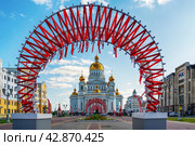 Saransk, Russia - June 5, 2023. Cathedral of St. Theodore Ushakov in Saransk, Russia. It is named after the Russian saint and admiral Fyodor Ushakov. The inscription above the entrance of the Cathedral of the Holy Righteous Warrior Theodore Ushakov. Редакционное фото, фотограф Оксана Медведева / Фотобанк Лори