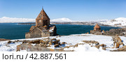 Sevanavank Monastery on Lake Sevan in Armenia in early spring (2024 год). Стоковое фото, фотограф Юлия Бабкина / Фотобанк Лори