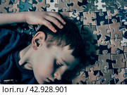 A child with autism spectrum disorders (ASD) such as Asperger's, Rhett and Heller. Стоковое AI-изображение, AI-художник Ирина Ручушкина / Фотобанк Лори