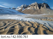 Landscape of antarctic dry valley, area free of snow and ice in the otherwise ice-covered continent. Стоковое AI-изображение, AI-художник Евгений Харитонов / Фотобанк Лори