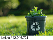 Green Plant growing in a pot with recycle symbol icon, eco sign. Bokeh blur natural background. Copy space for text. Saving the Earth, Earth Day, environmental sustainability. Reforestation. Стоковое AI-изображение, AI-художник Марина Демидюк / Фотобанк Лори