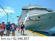Amazing giant cruise ship in ocean, beautiful blue sky. Summer holiday theme. Стоковое AI-изображение, AI-художник Ярославский Максим / Фотобанк Лори