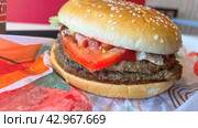Moscow April 10 2024, Double Whopper Burger. King/Fast food restaurant and self-service checkouts. Burger on a tray in fast food restaurant close-up. Редакционное фото, фотограф Скрипачев Антон / Фотобанк Лори
