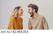 A happy couple laughing together. A fictional character. Стоковое AI-изображение, AI-художник Ярославский Максим / Фотобанк Лори