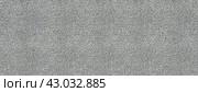 Grey Granular Surface or background. Granularity showcased in varying shades of gray and white colors. Panorama with copy space. Стоковое AI-изображение, AI-художник Igor Tichonow / Фотобанк Лори