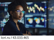 Persevering Analyst woman with financial graph displays. Generate ai. Стоковое AI-изображение, AI-художник Иван Рябоконь / Фотобанк Лори