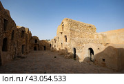 Ruins of Berber granary structures in Ksar Daghar in Tunisia. Стоковое фото, фотограф Яков Филимонов / Фотобанк Лори