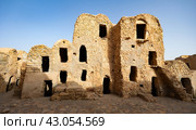 Ruins of Berber granary structures in Ksar Daghar in Tunisia. Стоковое фото, фотограф Яков Филимонов / Фотобанк Лори