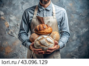 Fresh delicious bread in the hands of a male baker in close-up. Freshly baked sourdough bread with a golden crust on a wooden board. The context of a bakery with delicious bread. Confectionery products. Стоковое AI-изображение, AI-художник Photojuli / Фотобанк Лори