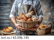 Delicious fresh bread in the hands of a male baker in close-up. Freshly baked sourdough bread with a golden crust in a wicker basket. The atmosphere of a bakery with delicious bread. Confectionery products. Стоковое AI-изображение, AI-художник Photojuli / Фотобанк Лори