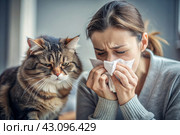 A woman sneezes into a white napkin at home. Allergies to cats and pet hair. There's a cat sitting next to me. Стоковое AI-изображение, AI-художник Photojuli / Фотобанк Лори