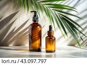 Aromatherapy. A glass bottle with a pipette for oil, lotion and palm leaves on a concrete background. Natural organic eco-cosmetics. The layout of the corporate identity of the beauty salon. Стоковое AI-изображение, AI-художник Photojuli / Фотобанк Лори