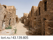 Ghorfa storage graneries of traditional Berber mud brick fortified Ksar of Hedada or Hadada, near Tetouin, Tunisia. Стоковое фото, фотограф Яков Филимонов / Фотобанк Лори