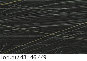 Scratched film texture. Many bright lines in different directions on a dark background. Perfect for grunge design. Стоковое фото, фотограф Андрей Степанов / Фотобанк Лори