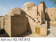 Old houses in Itchan Kala, the walled inner town of the city of Khiva. Стоковое фото, фотограф Юлия Белоусова / Фотобанк Лори