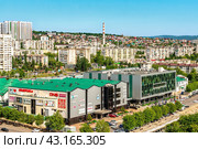 Вид сверху на Южный торговый центр - рынок Новороссийска (2024 год). Редакционное фото, фотограф Владимир Ушаров / Фотобанк Лори