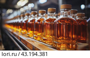 Automatic production line fills glass bottles with cognac. Стоковое AI-видео, аниматор Ирина Михайличенко / Фотобанк Лори