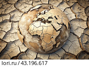 The concept of global warming of the planet earth. Dry and cracked earth, dry due to lack of rain. The effects of climate change. Стоковое AI-изображение, AI-художник Photojuli / Фотобанк Лори