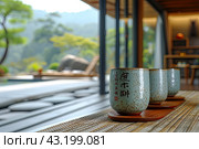 Chinese Ceremony. Brown ceramic pot and brown cup .Green tea on bamboo mat, aged wooden table. Japanese Tea - Hot Teapot And Teacups On Bamboo Mat. Стоковое AI-изображение, AI-художник Ирина Михайличенко / Фотобанк Лори