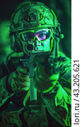Soldier Holding Gun. Стоковое AI-изображение, AI-художник Юлия Гапеенко / Фотобанк Лори