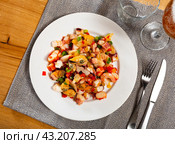 Popular Spanish appetizer, seafood salpicon, is served on plate. Стоковое фото, фотограф Яков Филимонов / Фотобанк Лори