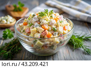 Traditional Russian Olivier salad for a feast on a plate on a wooden countertop. generative AI. Стоковое AI-изображение, AI-художник Photojuli / Фотобанк Лори