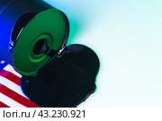 Black oil barrel with oil drop on white background. Стоковое фото, фотограф Сергей Толмачёв / Фотобанк Лори