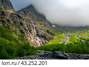 Midagradinskaya mountain valley is surrounded by a giant barrier of vertical rocks. Stone massifs block access to the glaciers of the peaks of Dzhimarai-Khokh, Zeigelan and Donzhety. North Caucasus. Russia. Стоковое фото, фотограф Константин Лабунский / Фотобанк Лори