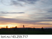 Spring sunset over the field. Стоковое фото, фотограф Andrew_Swarga / Фотобанк Лори