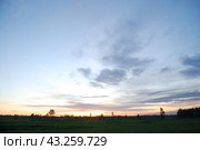 Spring sunset over the field. Стоковое фото, фотограф Andrew_Swarga / Фотобанк Лори