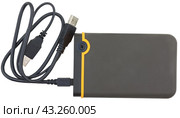 Внешний жесткий диск на белом фоне. External portable hard drive, isolated on a white background. Стоковое фото, фотограф Татьяна Д / Фотобанк Лори