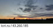 Spring sunset over the field. Стоковое фото, фотограф Andrew_Swarga / Фотобанк Лори