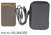 Внешний жесткий диск на белом фоне. External portable hard drive, isolated on a white background. Стоковое фото, фотограф Татьяна Д / Фотобанк Лори