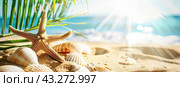 A landscape with sea surf, seashells and a sunny beach. Copy space. The concept of summer holidays. Стоковое AI-изображение, AI-художник Ярославский Максим / Фотобанк Лори