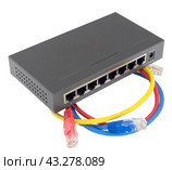 Сетевой коммутатор с подключенными разноцветными сетевыми кабелями. Closeup of network cables connected to router on white. Стоковое фото, фотограф Татьяна Д / Фотобанк Лори
