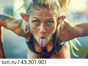 A young woman with elf ears sticks out her tongue in a playful manner while outdoors at sunset, creating a whimsical and light-hearted moment. Стоковое AI-изображение, AI-художник Данила Большаков / Фотобанк Лори
