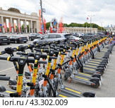 Moscow, Russia - May 9. 2024. Whoosh scooter sharing near Gorky Park. Редакционное фото, фотограф Володина Ольга / Фотобанк Лори