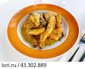 Piquant chicken with cava, cinnamon and pear sauce at plate. Стоковое фото, фотограф Яков Филимонов / Фотобанк Лори