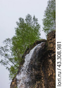 One of the Honey waterfalls is under bright sky on a summer day. Стоковое фото, фотограф EugeneSergeev / Фотобанк Лори
