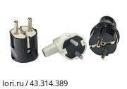 Электрические вилки на белом фоне. The electric plug on a white background. Стоковое фото, фотограф Татьяна Д / Фотобанк Лори