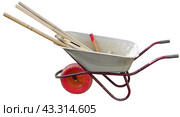 Садовая металлическая тележка-тачка, изолированная на белом фоне. Garden metal wheelbarrow cart isolated on white background. Стоковое фото, фотограф Татьяна Д / Фотобанк Лори